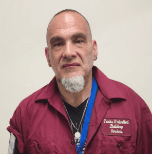 Man with goatee, ready for work